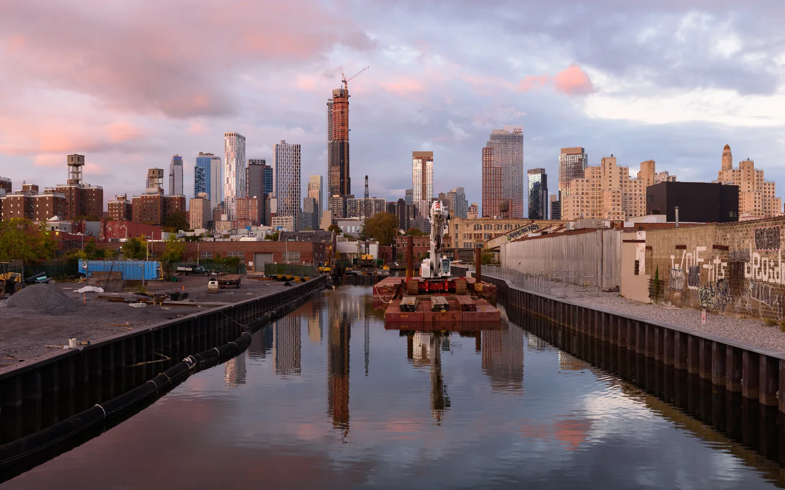A street view of Union Street in Gowanus with pedestrians and storefronts on a clear day
